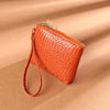 The Frame Wristlet Orange