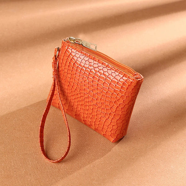 The Frame Wristlet Orange